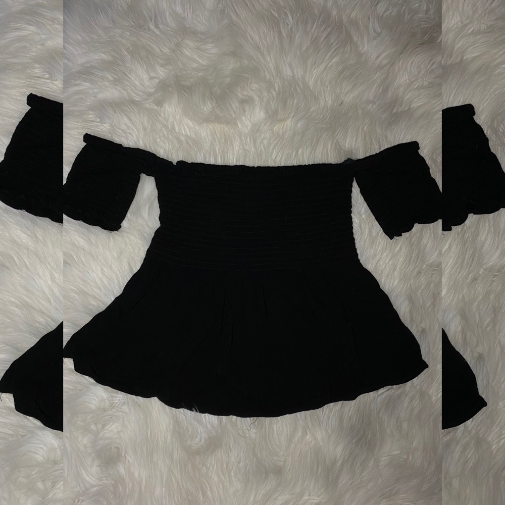 Black off the shoulder top.